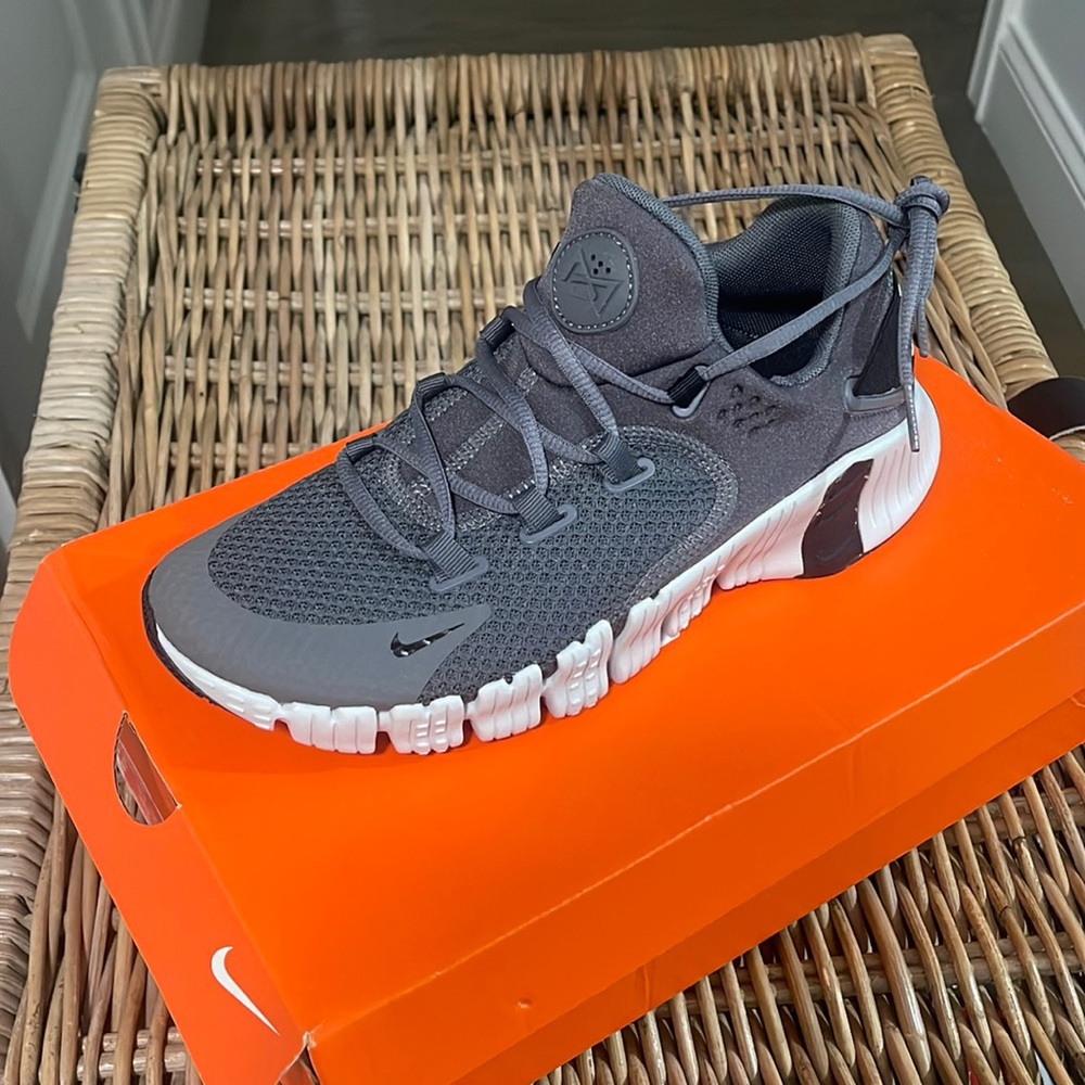 Nike sneakers.   Gray and white brand new